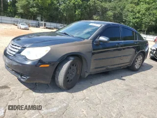 2010 Chrysler Sebring Limited with VIN 1C3CC5FB0AN147809, listed as a Copart auction lot 65013015 with 182,066 mi miles and Salvage title. Bid and sale history available at DreamBid. Image 1.