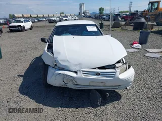 1999 Toyota Camry LE z VIN 4T1BG22K0XU862535, wystawiony jako IAAI lot #42116856 z przebiegiem 186 094 mil mil oraz . Historia ofert i sprzedaży dostępna na DreamBid. Obrazek 13.