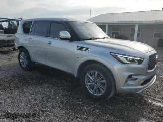 2019 Infiniti QX80 LUXE with VIN JN8AZ2NF3K9682037, listed as a Copart auction lot 52726034 with 127,381 mi miles. Bid and sale history available at carsss.com. Image 4.