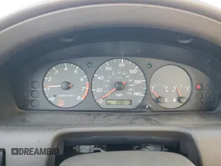 2002 Mazda 626 LX with VIN 1YVGF22C125279863, listed as a Copart auction lot 87103664 with 139,633 mi miles and Salvage Title. Bid and sale history available at carsss.com. Image 9.
