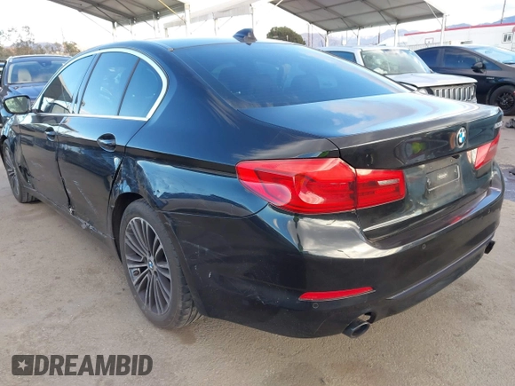 2019 BMW 5 Series 530i with VIN WBAJA5C54KWW45379, listed as a IAAI auction lot 41276092 with 77,025 mi miles. Bid and sale history available at carsss.com. Image 3.
