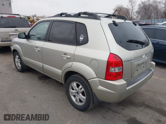 2007 Hyundai Tucson SE with VIN KM8JN72D47U492545, listed as a IAAI auction lot 41727816 with 203,065 mi miles and . Bid and sale history available at DreamBid. Image 3.