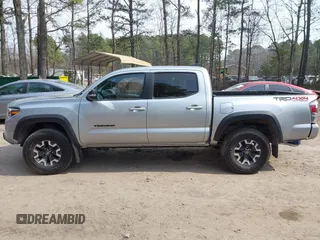 2022 Toyota Tacoma SR with VIN 3TMCZ5ANXNM497511, listed as a IAAI auction lot 41670710 with 26,277 mi miles and . Bid and sale history available at DreamBid. Image 14.