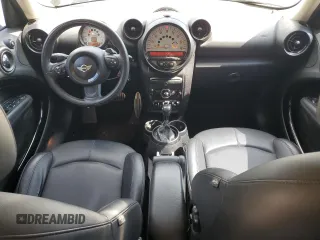 2014 MINI Countryman S with VIN WMWZC3C57EWP25099, listed as a Copart auction lot 62646555 with 153,059 mi miles and Salvage title. Bid and sale history available at DreamBid. Image 8.