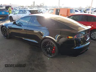 2023 Tesla Model S Plaid с VIN 5YJSA1E66PF518117, выставлен на аукционе IAAI как лот 41344515 с пробегом Не указан миль и . История ставок и продаж доступна на DreamBid. Изображение 3.