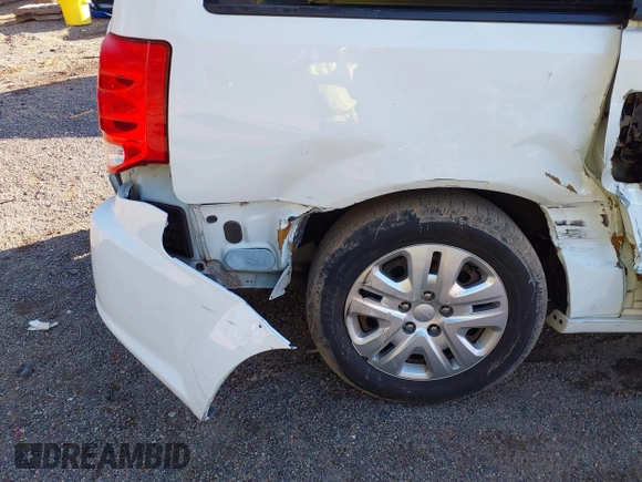 2019 Dodge Grand Caravan SE with VIN 2C4RDGBG2KR799660, listed as a IAAI auction lot 41898556 with 104,642 mi miles and . Bid and sale history available at DreamBid. Image 6.