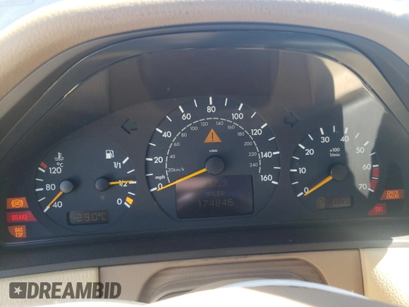 2001 Mercedes-Benz E-Class AWD with VIN WDBJH82J91X057063, listed as a Copart auction lot 70235274 with 174,846 mi miles and Salvage Title. Bid and sale history available at carsss.com. Image 9.