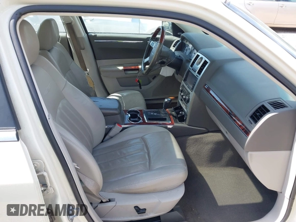 2010 Chrysler 300 C Hemi with VIN 2C3CA6CT6AH114461, listed as a IAAI auction lot 41779993 with 126,898 mi miles and . Bid and sale history available at carsss.com. Image 5.