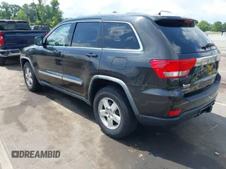 2011 Jeep Grand Cherokee Laredo with VIN 1J4RS4GG5BC534960, listed as a IAAI auction lot 42277395 with 223,690 mi miles and . Bid and sale history available at DreamBid. Image 3.