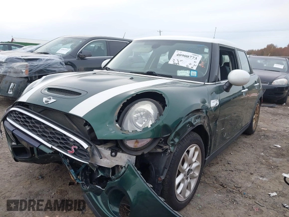 2015 MINI Hardtop 4 Door S with VIN WMWXU3C5XF2B59066, listed as a IAAI auction lot 40900773 with 14,618 mi miles and . Bid and sale history available at DreamBid. Image 2.