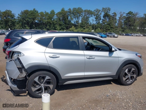 2018 Hyundai Tucson Value with VIN KM8J3CA26JU697712, listed as a IAAI auction lot 40323457 with 53,175 mi miles. Bid and sale history available at carsss.com. Image 13.