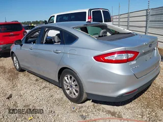 2016 Ford Fusion S z VIN 3FA6P0G76GR377005, wystawiony jako IAAI lot #42006585 z przebiegiem 100 575 mil mil oraz . Historia ofert i sprzedaży dostępna na DreamBid. Obrazek 3.