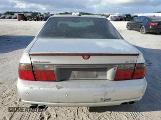 2003 Cadillac Seville Touring STS z VIN 1G6KY54923U101998, wystawiony jako Copart lot #74029304 z przebiegiem 134 157 mil mil oraz Szkoda całkowita • Salvage title. Historia ofert i sprzedaży dostępna na DreamBid. Obrazek 6.