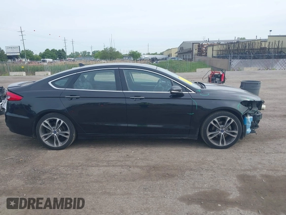 2020 Ford Fusion Titanium with VIN 3FA6P0K94LR117138, listed as a IAAI auction lot 42345819 with 88,117 mi miles and . Bid and sale history available at DreamBid. Image 14.