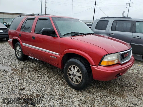 2000 GMC Jimmy SLE Convenience z VIN 1GKDT13W0Y2273829, wystawiony jako Copart lot #84811284 z przebiegiem 129 635 mil mil oraz Szkoda całkowita • Salvage title. Historia ofert i sprzedaży dostępna na DreamBid. Obrazek 4.