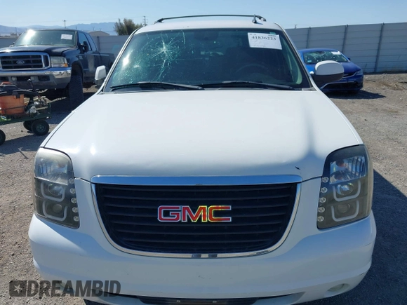 2007 GMC Yukon XL SLT with VIN 1GKFC16007R427817, listed as a IAAI auction lot 41836223 with 154,599 mi miles. Bid and sale history available at carsss.com. Image 6.