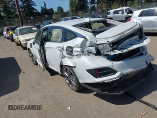2019 Honda Clarity with VIN JHMZC5F1XKC007033, listed as a IAAI auction lot 42064611 with 28,458 mi miles. Bid and sale history available at carsss.com. Image 3.