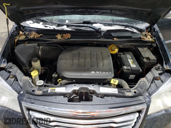 2014 Chrysler Town & Country Limited with VIN 2C4RC1GG9ER156039, listed as a Copart auction lot 88403185 with 111,663 mi miles and Salvage Title. Bid and sale history available at DreamBid. Image 12.