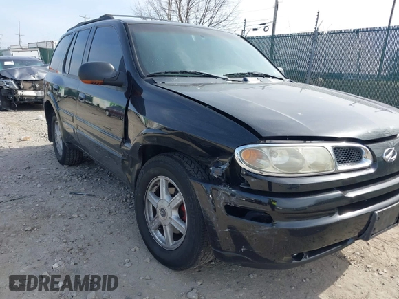 2002 Oldsmobile Bravada z VIN 1GHDT13S222469507, wystawiony jako IAAI lot #41787362 z przebiegiem Nie podano mil oraz . Historia ofert i sprzedaży dostępna na DreamBid. Obrazek 6.