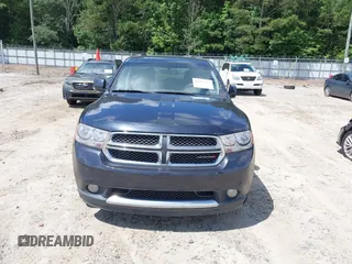 2013 Dodge Durango Crew with VIN 1C4RDHDG7DC657898, listed as a IAAI auction lot 42522353 with 234,483 mi miles and . Bid and sale history available at DreamBid. Image 6.