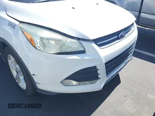 2016 Ford Escape SE z VIN 1FMCU0GX3GUC30456, wystawiony jako IAAI lot #42387320 z przebiegiem 99 033 mil mil oraz . Historia ofert i sprzedaży dostępna na DreamBid. Obrazek 36.