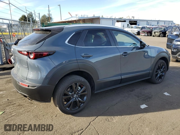 2023 Mazda CX-30 S Carbon Edition z VIN 3MVDMBCM5PM512410, wystawiony jako Copart lot #83490034 z przebiegiem 23 783 mil mil oraz Nie do naprawy • Non repairable. Historia ofert i sprzedaży dostępna na DreamBid. Obrazek 3.