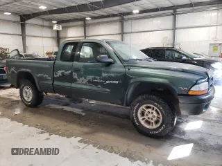 1999 Dodge Dakota SLT with VIN 1B7GG22Y9XS149398, listed as a Copart auction lot 47950025 with 173,413 mi miles and Salvage Title. Bid and sale history available at carsss.com. Image 4.