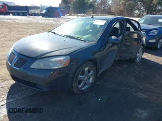 2005 Pontiac G6 GT with VIN 1G2ZH528354169479, listed as a IAAI auction lot 41430508 with 241,576 mi miles. Bid and sale history available at carsss.com. Image 2.