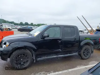 2019 Nissan Frontier SV z VIN 1N6AD0ER5KN797638, wystawiony jako IAAI lot #42479962 z przebiegiem 98 620 mil mil oraz . Historia ofert i sprzedaży dostępna na DreamBid. Obrazek 14.