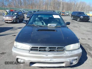1999 Subaru Legacy Outback z VIN 4S3BG6857X7627688, wystawiony jako IAAI lot #41712387 z przebiegiem 187 697 mil mil oraz . Historia ofert i sprzedaży dostępna na DreamBid. Obrazek 12.