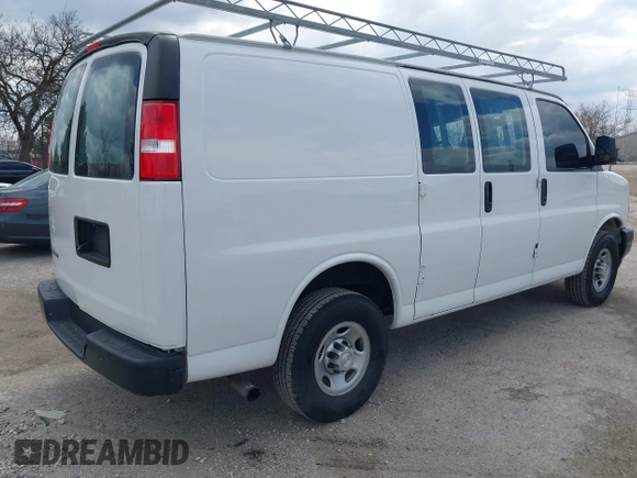2018 Chevrolet Express Cargo Van with VIN 1GCWGAFP6J1336229, listed as a IAAI auction lot 42022722 with 99,005 mi miles. Bid and sale history available at carsss.com. Image 4.