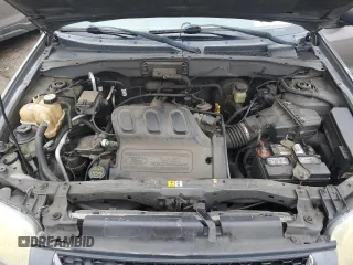 2003 Ford Escape XLT Popular 2 with VIN 1FMYU93163KE03257, listed as a Copart auction lot 66966644 with 209,618 mi miles and Salvage Title. Bid and sale history available at carsss.com. Image 12.