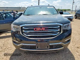 2018 GMC Acadia SLT with VIN 1GKKNMLS8JZ144623, listed as a Copart auction lot 58266545 with 126,966 mi miles and Salvage title. Bid and sale history available at DreamBid. Image 5.