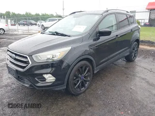 2017 Ford Escape SE with VIN 1FMCU0GD3HUD07141, listed as a IAAI auction lot 42250771 with 116,086 mi miles and . Bid and sale history available at DreamBid. Image 2.