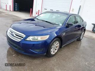 2011 Ford Taurus SE with VIN 1FAHP2DW7BG128857, listed as a IAAI auction lot 41705643 with 163,589 mi miles. Bid and sale history available at carsss.com. Image 2.