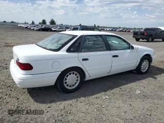1993 Ford Taurus z VIN 1FALP5348PG189055, wystawiony jako Copart lot #58589175 z przebiegiem 45 421 mil mil oraz Tytuł czysty. Historia ofert i sprzedaży dostępna na DreamBid. Obrazek 3.