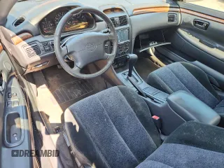 2000 Toyota Solara SE with VIN 2T1CF22P2YC287215, listed as a Copart auction lot 62661435 with 65,371 mi miles and Clean title. Bid and sale history available at DreamBid. Image 8.