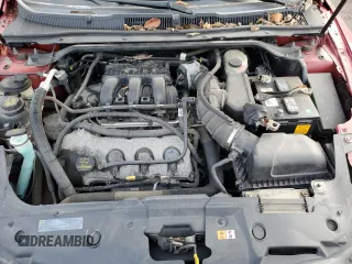 2012 Ford Taurus SEL with VIN 1FAHP2EW0CG133348, listed as a Copart auction lot 83031894 with 231,825 mi miles and Salvage Title. Bid and sale history available at DreamBid. Image 11.