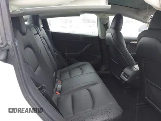 2023 Tesla Model 3 with VIN 5YJ3E1EA6PF432397, listed as a IAAI auction lot 41760895 with 15,692 mi miles and . Bid and sale history available at DreamBid. Image 8.