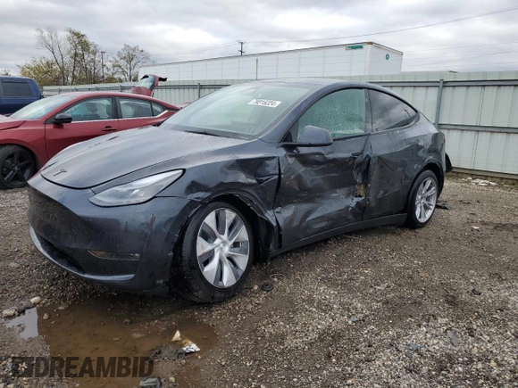 2024 Tesla Model Y Long Range z VIN 7SAYGDEE3RF087162, wystawiony jako Copart lot #79315224 z przebiegiem 3 232 mil mil oraz Szkoda całkowita • Salvage title. Historia ofert i sprzedaży dostępna na DreamBid. Obrazek 1.