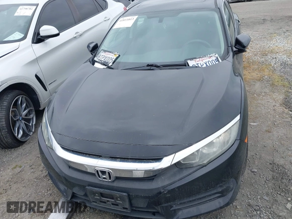 2017 Honda Civic EX z VIN 2HGFC2F75HH573907, wystawiony jako IAAI lot #41811813 z przebiegiem 89 937 mil mil oraz . Historia ofert i sprzedaży dostępna na DreamBid. Obrazek 12.