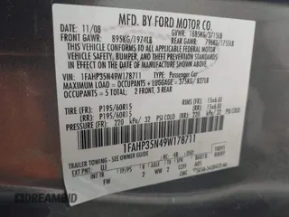 2009 Ford Focus SE with VIN 1FAHP35N49W178711, listed as a IAAI auction lot 42084721 with 203,889 mi miles. Bid and sale history available at carsss.com. Image 9.