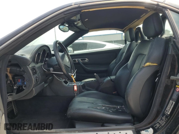 2003 Mercedes-Benz SLK 230 Kompressor with VIN WDBKK49F13F277323, listed as a Copart auction lot 53980515 with 174,276 mi miles and Salvage Title. Bid and sale history available at DreamBid. Image 7.