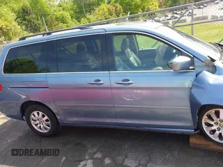 2008 Honda Odyssey EX-L with VIN 5FNRL38758B021134, listed as a IAAI auction lot 42097387 with 155,355 mi miles and . Bid and sale history available at DreamBid. Image 14.