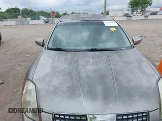 2004 Nissan Maxima SE with VIN 1N4BA41E74C858809, listed as a IAAI auction lot 42436562 with 198,105 mi miles and . Bid and sale history available at DreamBid. Image 12.