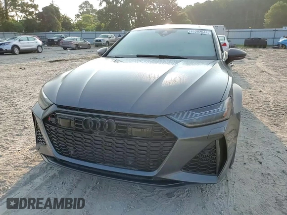2022 Audi RS 7 z VIN WUAPCBF22NN912345, wystawiony jako Copart lot #41202044 z przebiegiem 5076 mil mil oraz Szkody całkowita. Historia ofert i sprzedaży dostępna na DreamBid. Obrazek 11.