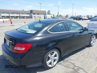 2014 Mercedes-Benz C-Class C 250 with VIN WDDGJ4HBXEG296917, listed as a IAAI auction lot 42068339 with 124,872 mi miles. Bid and sale history available at carsss.com. Image 4.