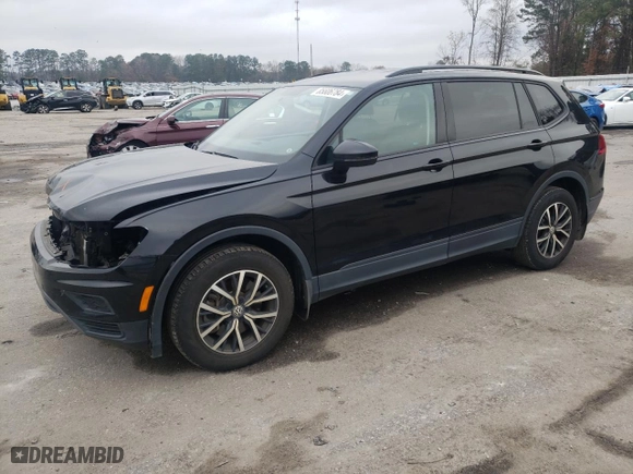 2021 Volkswagen Tiguan S with VIN 3VV1B7AX2MM017521, listed as a Copart auction lot 85606784 with 92,075 mi miles and Salvage Title. Bid and sale history available at carsss.com. Image 1.