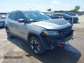 2018 Jeep Compass Trailhawk with VIN 3C4NJDDB2JT198784, listed as a IAAI auction lot 42405539 with 121,553 mi miles and . Bid and sale history available at DreamBid. Image 1.