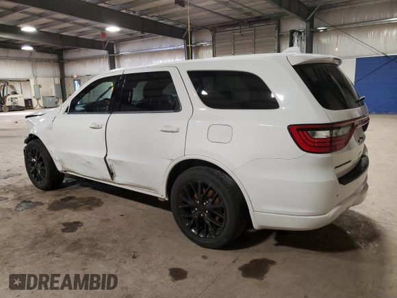 2015 Dodge Durango R/T with VIN 1C4SDHCTXFC916712, listed as a Copart auction lot 87113784 with 120,950 mi miles and Salvage Title. Bid and sale history available at DreamBid. Image 2.